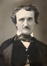 foto em preto e branco. Allan Poe com roupa formal. terno e gravata escuros e camisa branca