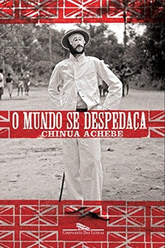 capa em preto e branco com tarjas vermelhas para os textos. na imagem, homem de pé numa clareira, de roupa branca, chapéu e máscara